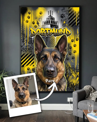 Handyfoto vom Hund neben dem gerahmten Poster in den Farben seiner Stadt